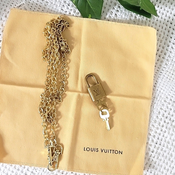 LOUIS VUITTON KEY AND LOCK. #321 - Picture 2 of 3